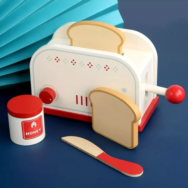Wooden toy toaster with accessories